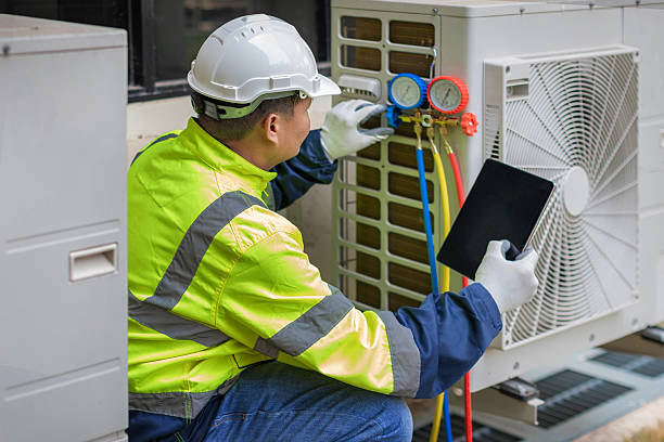 Professional Air Conditioning Repair technician working in Newcastle, OK